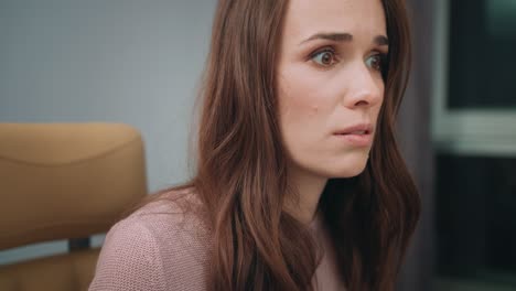 dissatisfied woman looking at computer screen. close up of upset woman face