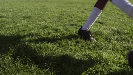 rugby player throwing the rugby ball