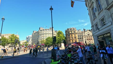 people and bikes in trafalgar square, london