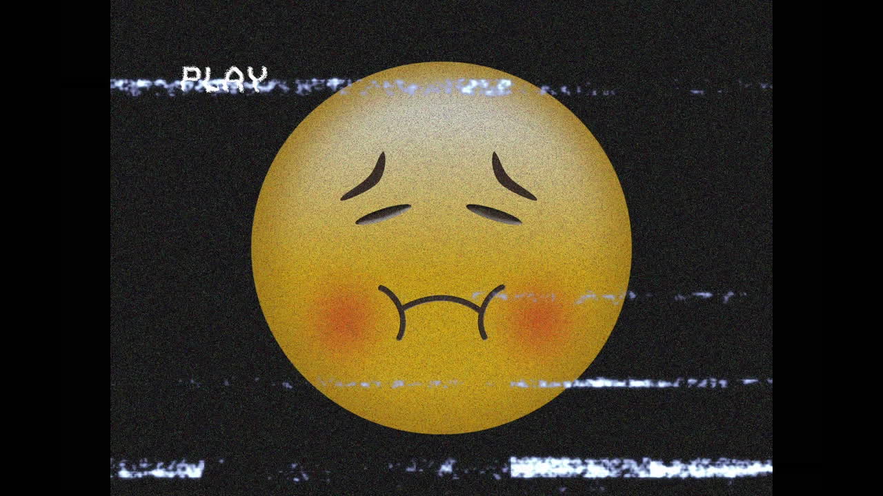 검은 바탕에 화면의 소음 위에 아픈 이모지 아이콘의 애니메이션