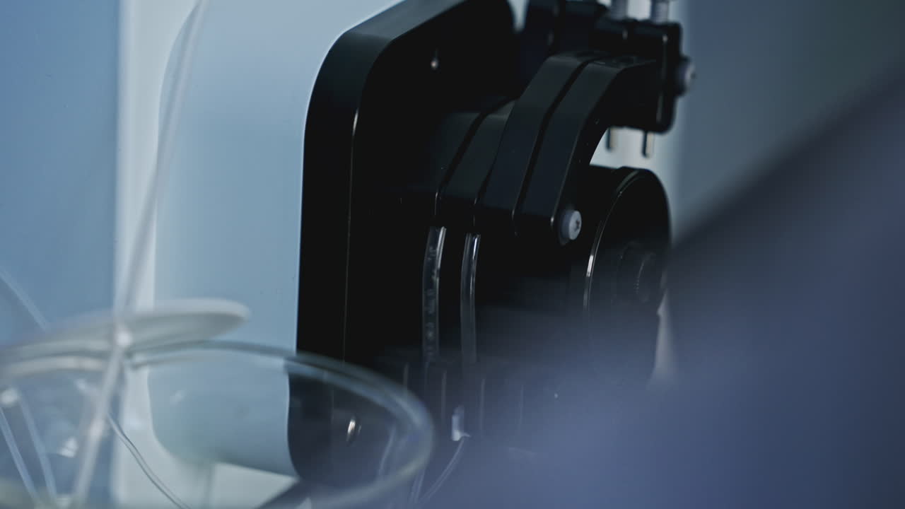 Close-up of laboratory pump and associated equipment