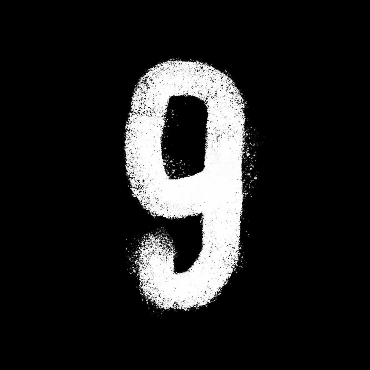Numero nove bianco animato a vernice spray su sfondo nero