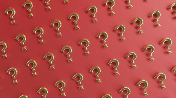 gold question mark on a red wall fan questions and answer concept