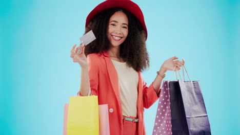 Happy,-woman-and-a-credit-card-for-shopping