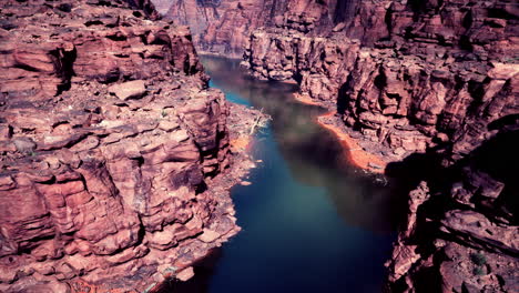 aerial view of a canyon with a river flowing through it