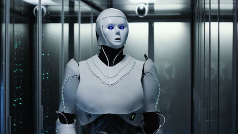 Robot working in a server room with a tablet