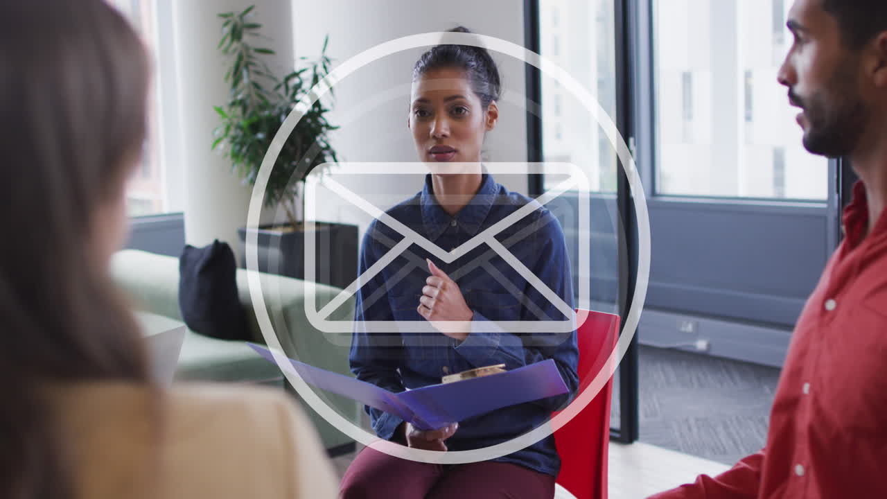 Animation of email icon and data processing over diverse business people in office