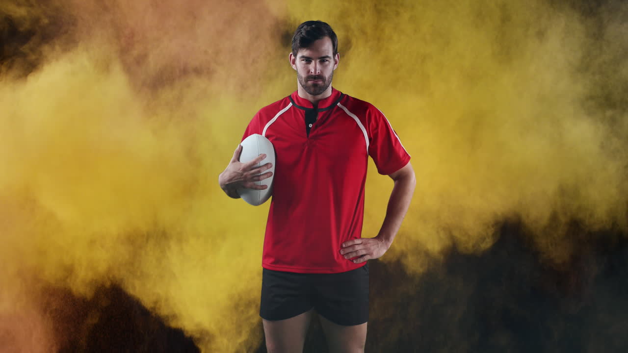 jugador de rugby profesional sosteniendo una pelota 4k