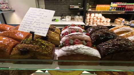 assorted pastries on display in a bakery