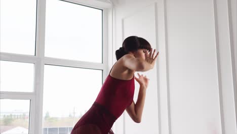 ballet dancer in red leotard