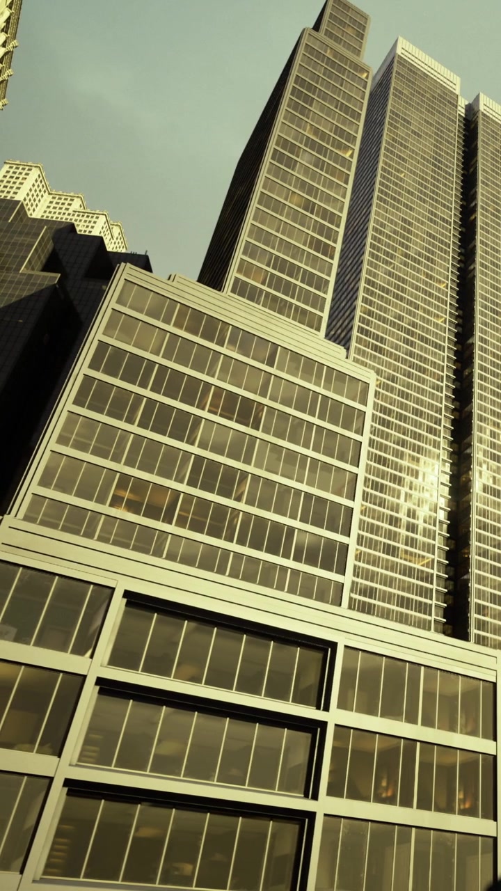 Horizonte da cidade exibindo arquitetura moderna de vidro com reflexos dourados.