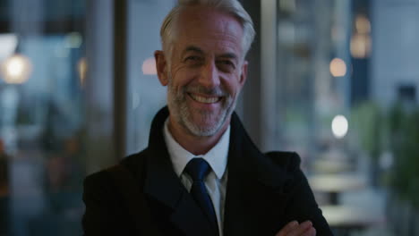 portrait-successful-mature-businessman-smiling-arms-crossed-executive-enjoying-professional-career-success-senior-caucasian-entrepreneur-in-late-urban-evening-slow-motion-leadership-ambition