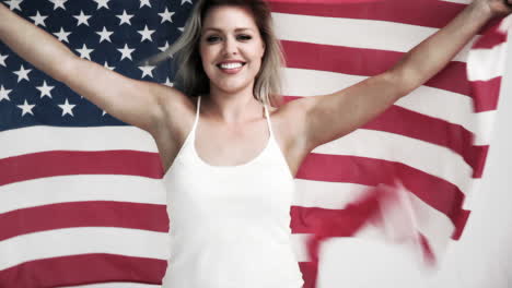 blonde woman holding a usa flag in cinemagraph