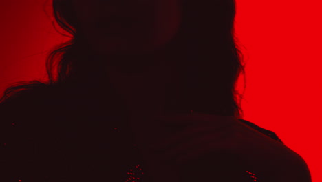 woman silhouette in red light