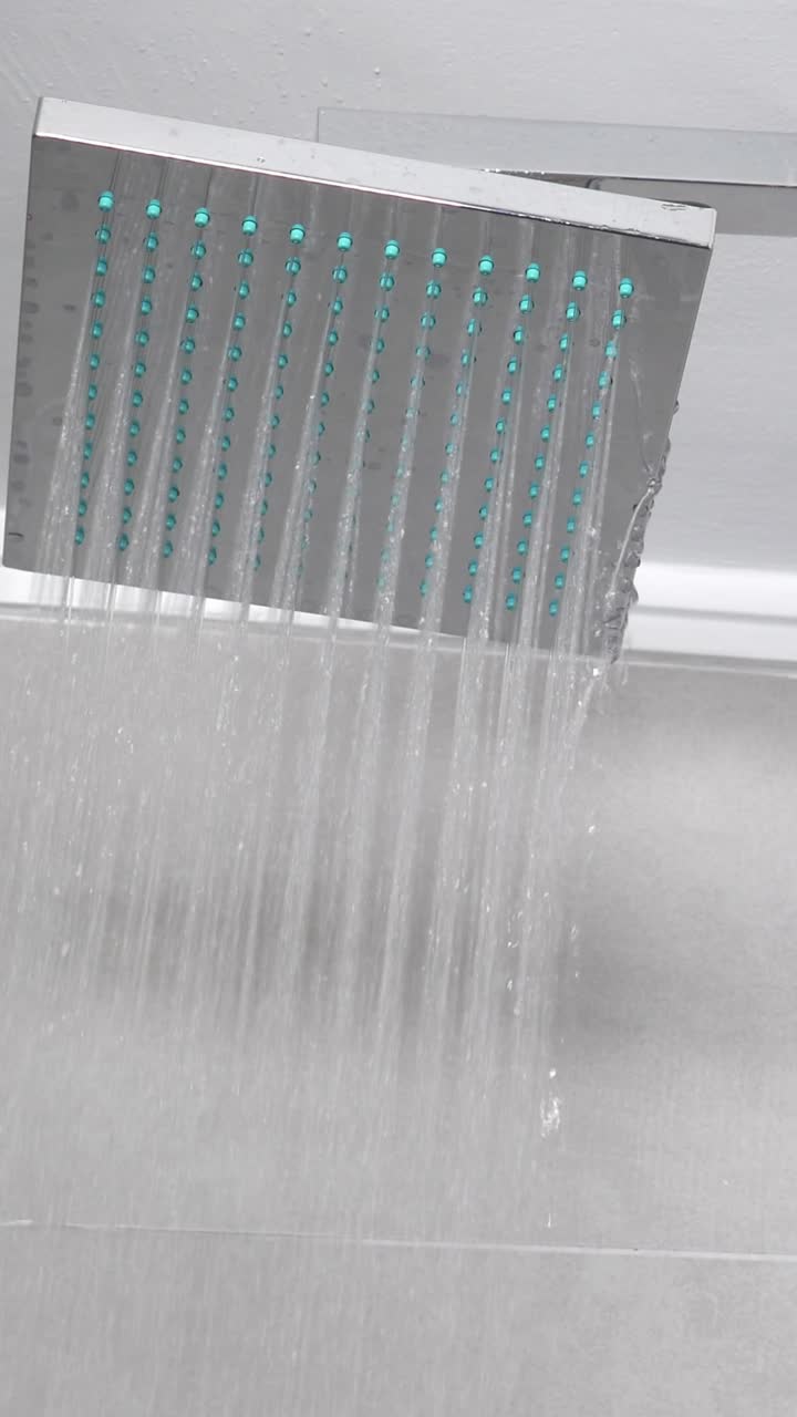 A modern shower head in a bathroom