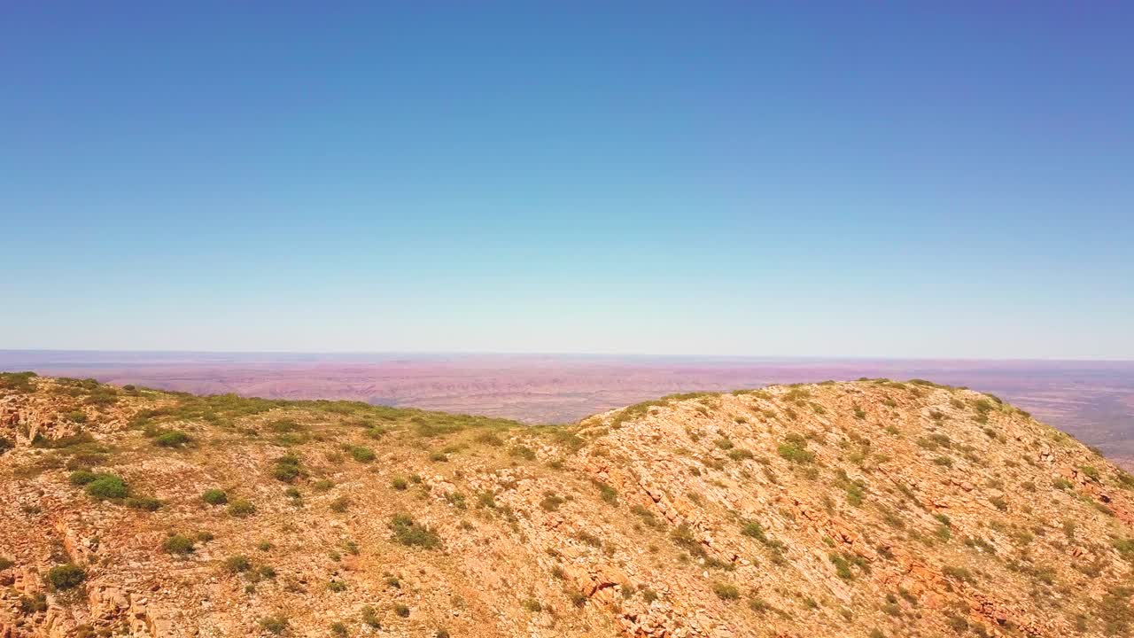 Mt Sonder - Central Australia. Cinematic aerial flyover revealing a vast flat landscape. Filmed on DJI Mavic Pro.