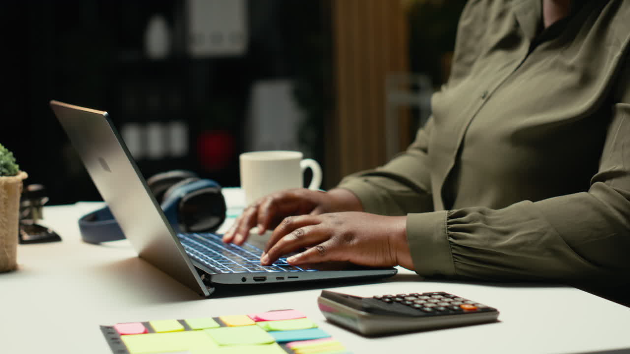Female specialist working after hours on proofreading and fact checking