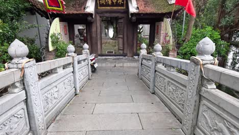 bridge leading to a traditional temple entrance