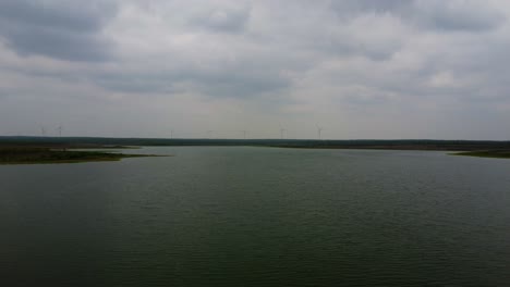 Flying-over-falcon-lake-towards-the-windmills