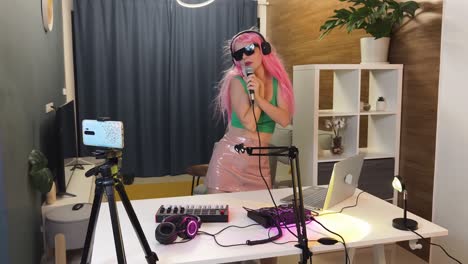 woman singing live stream in home studio