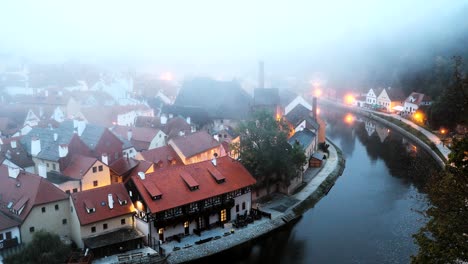 cesky krumlov, czech republic. cityscape in autumn morning misty fog. unesco world heritage site