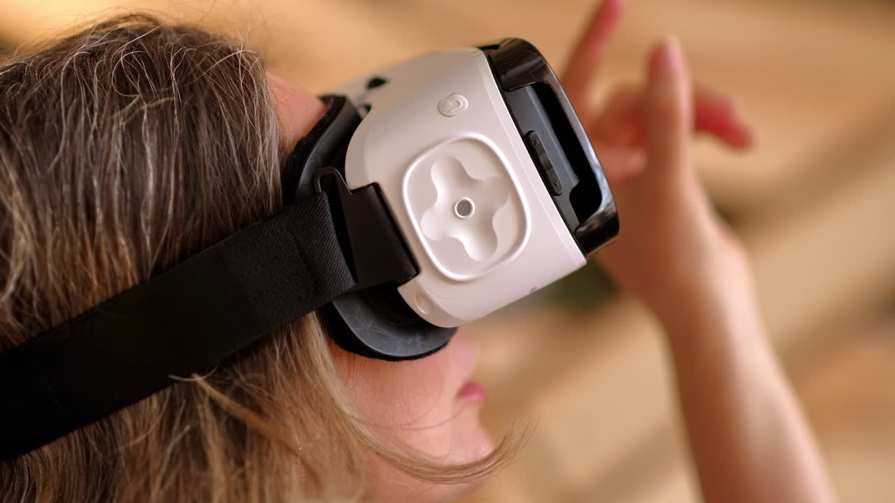 Woman enjoying looking through VR headset