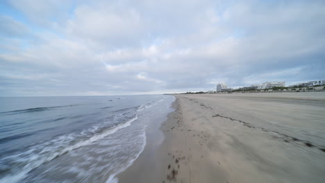 beautiful traveling shot on a beach day time with clouds occitanie france