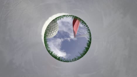 la pelota de golf vuela hacia el agujero en la vista de la cámara dentro del agujero de primer plano