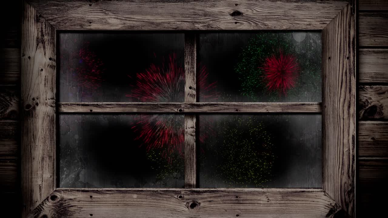 animación de la ventana con coloridos fuegos artificiales de navidad y año nuevo explotando en el cielo nocturno