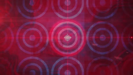 Animation-of-red-laser-beams-of-light-crossing-at-the-centre-of-circualr-red-and-blue-pattern