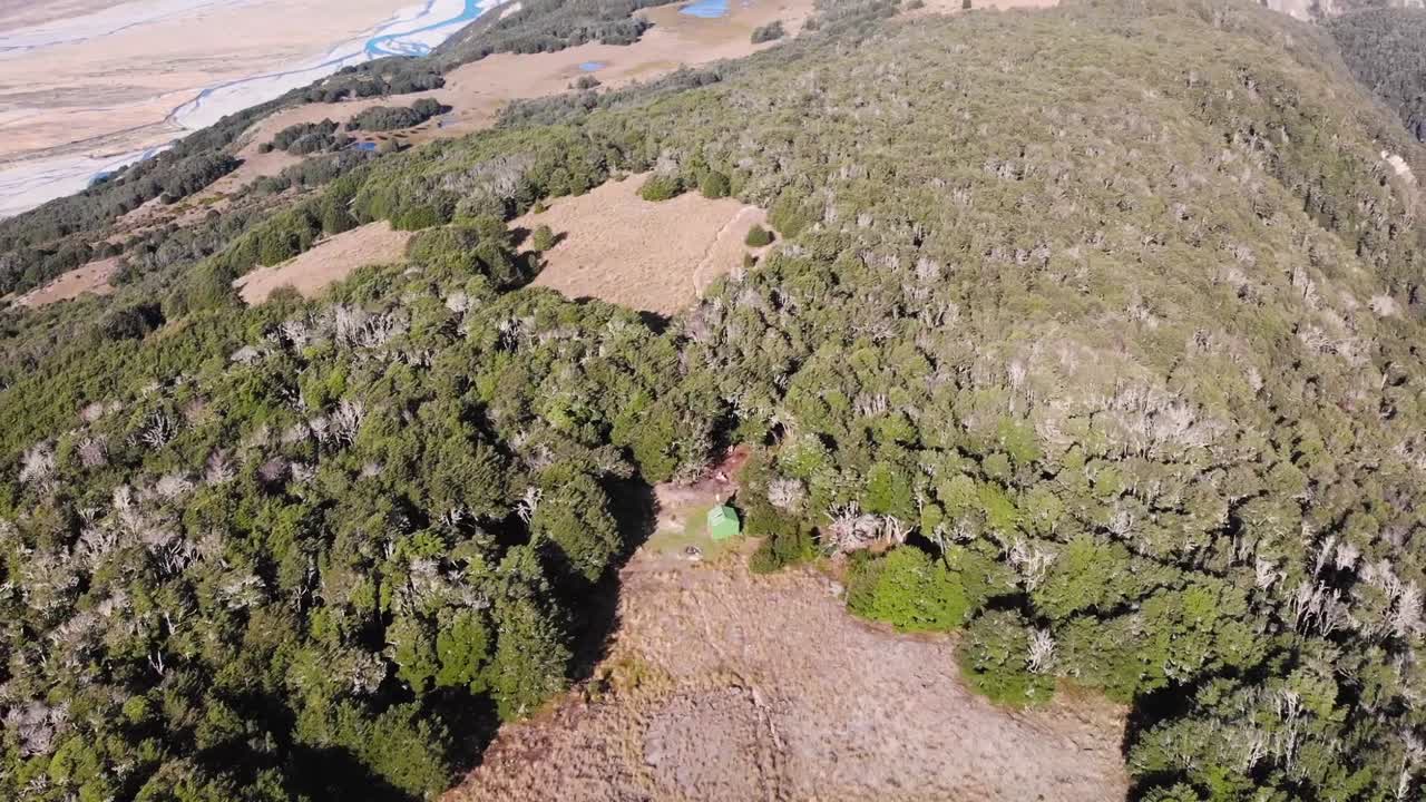 Bealey Spur Hut aerial reveal of beautiful scenery Southern Alps, Arthurs Pass, New Zealand