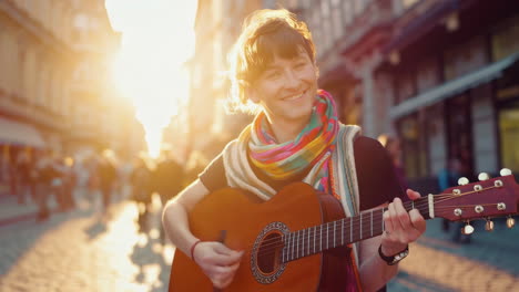 músico callejero tocando la guitarra acústica