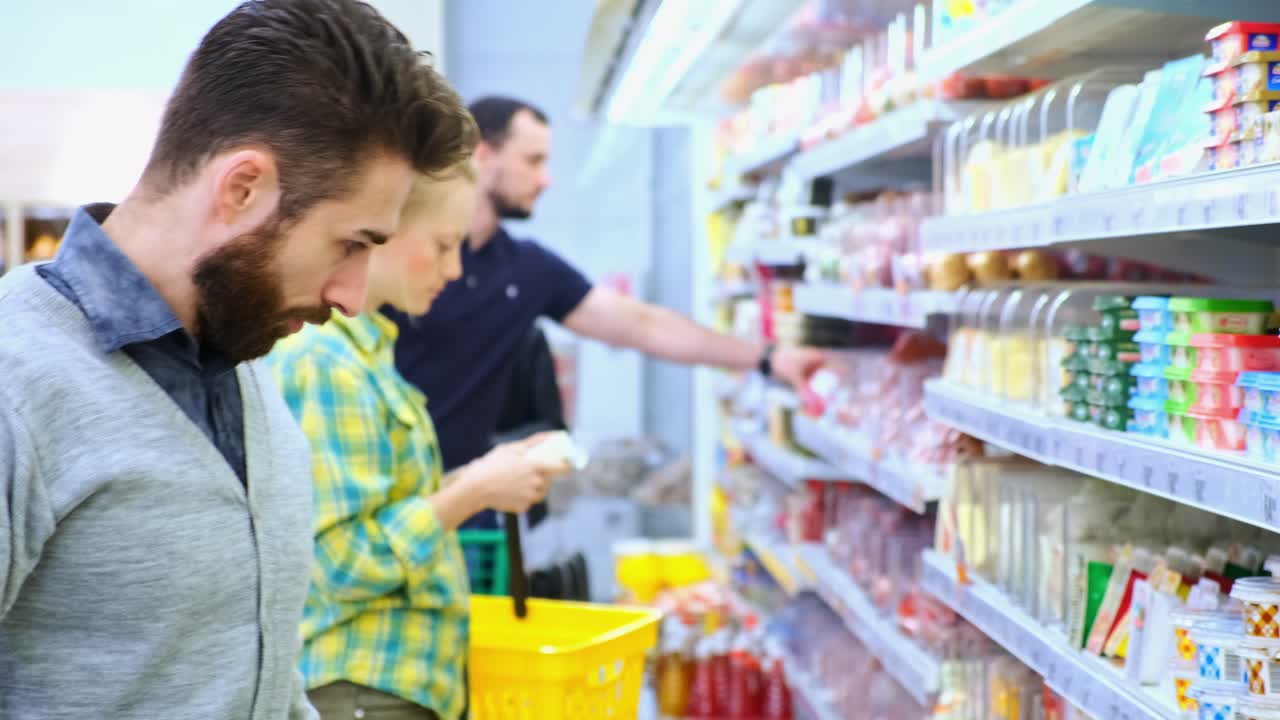 Family Shopping at Grocery Store