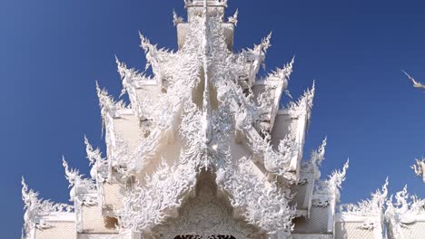 stunning architecture of famous white temple in chiang rai, thailand