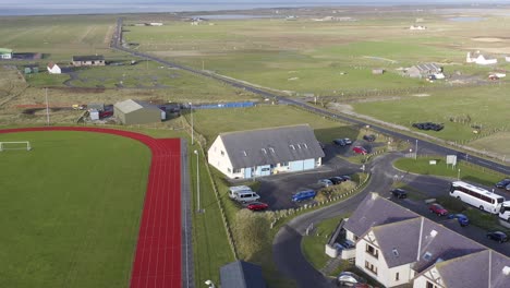 Drone-shot-circumnavigating-the-UHI-college-campus-on-the-Isle-of-Benbecula