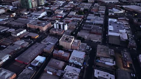aerial view of an urban cityscape at dusk
