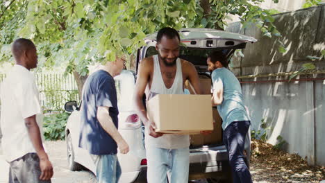 volunteers handing out donation boxes