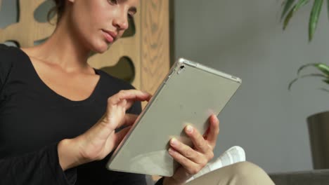 Close-up-of-Caucasian-woman-using-digital-tablet-in-lobby-at-hospital-4k