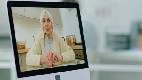 female doctor consulting with senior patient remotely