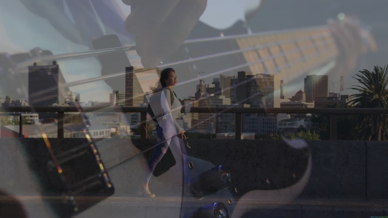 Woman walking rooftop terrace overlaying electric bass strings and pickups for music marketing