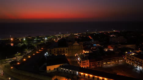 aerial view in front of santuario de san pedro claver, vibrant dusk in cartagena, colombia