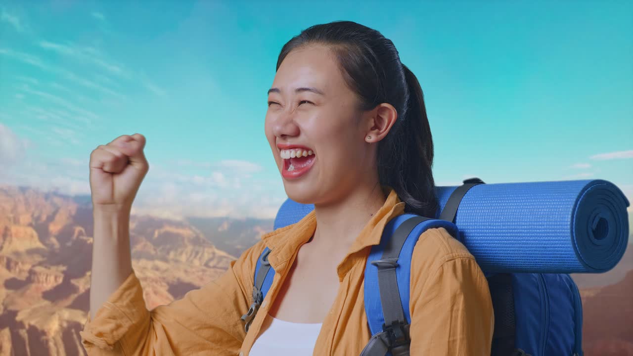 Close Up Side View Of Asian Female Hiker With Mountaineering Backpack Screaming Goal Celebrating The Success While Traveling At The Top Of Mountain