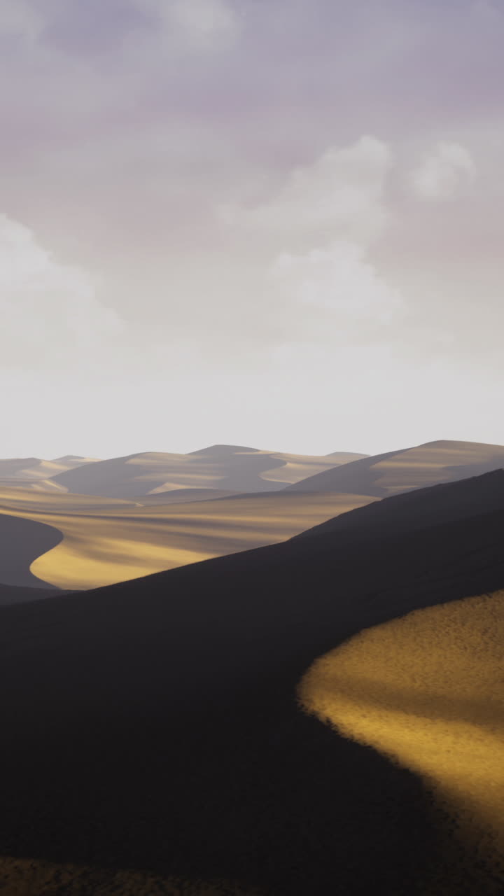Expansive desert landscape under a cloudy sky with rolling sand dunes