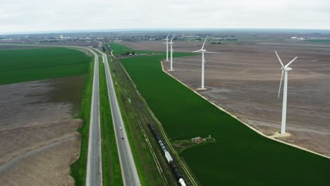 row of ecological wind turbines generating green electricity