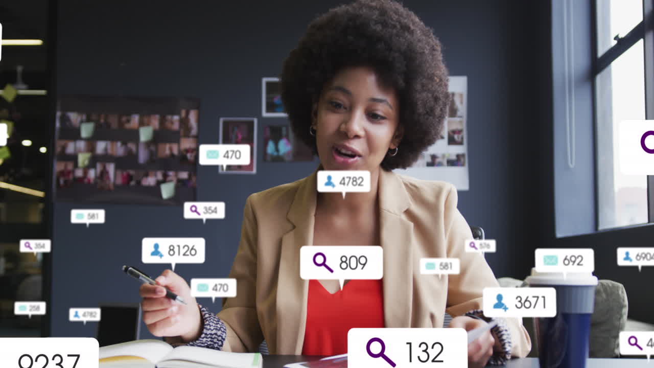 Animation of social media data processing over biracial businesswoman on video call