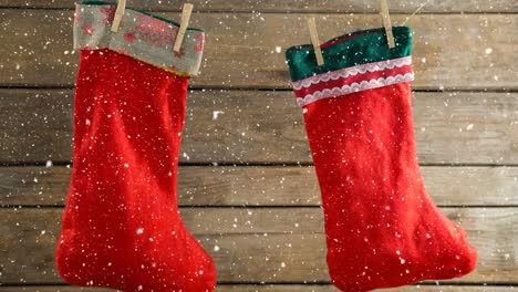 falling snow with christmas stockings decoration