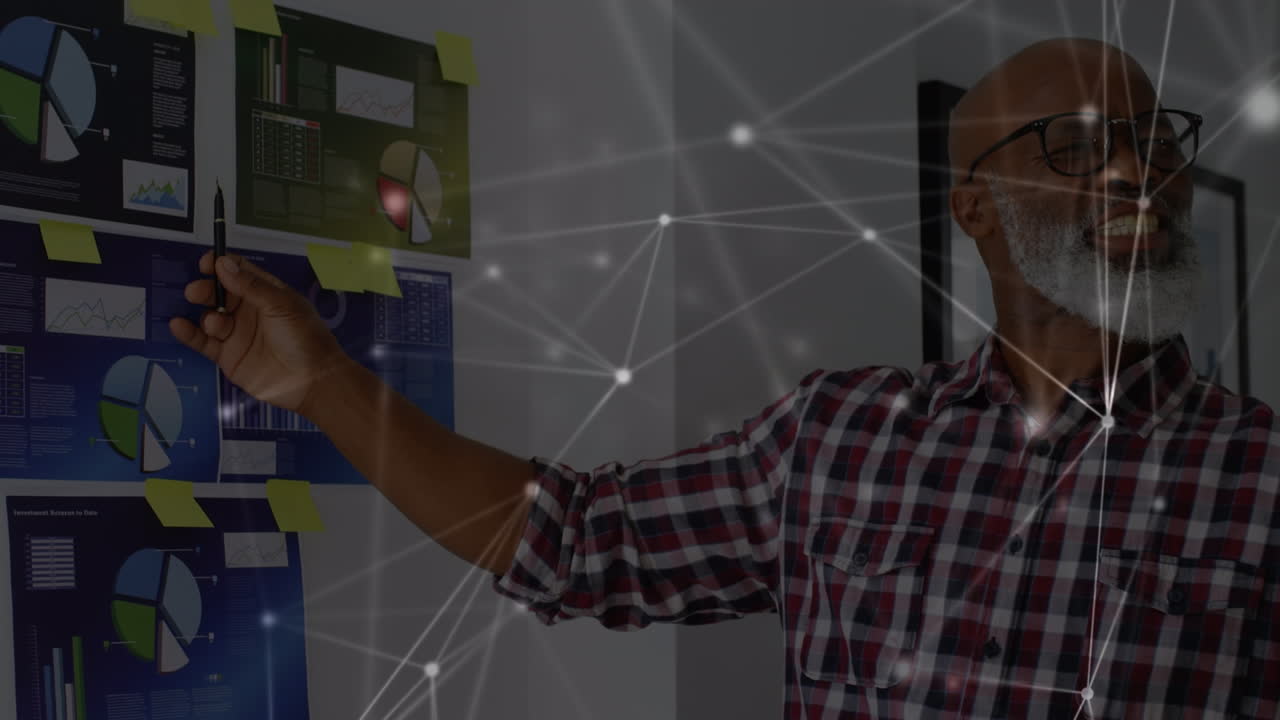 Animation of network of connections over senior african american man making presentation