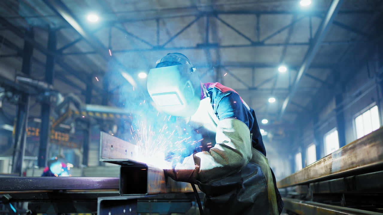 Welder Working in a Factory