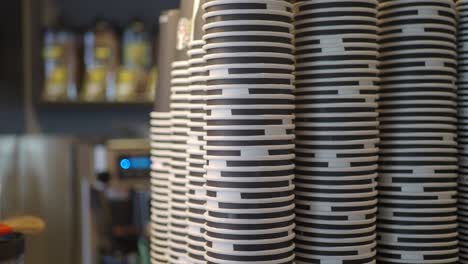 stacked paper coffee cups