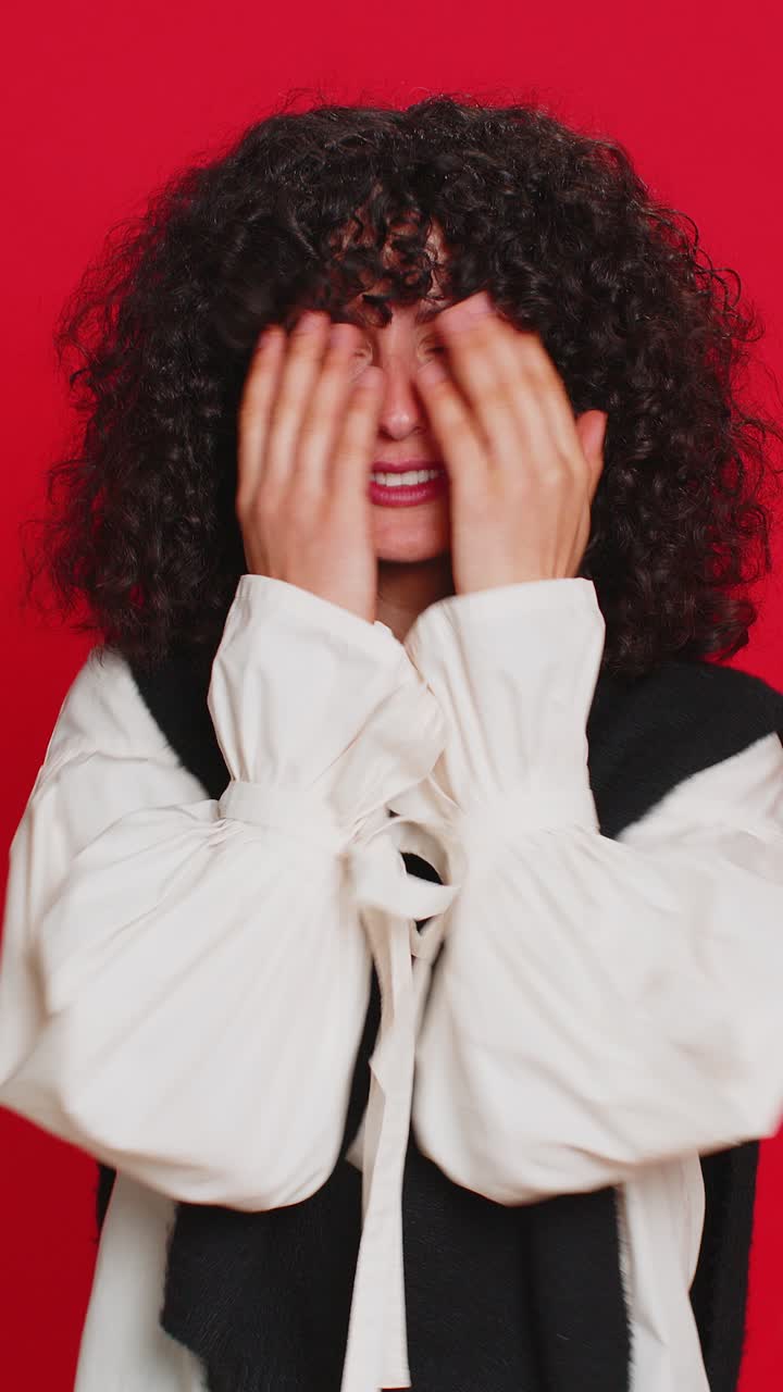 Afraid shocked young woman closing eyes confused shy scared reject to watch phobia shame stress